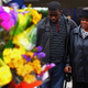 Community members lay wreaths at scene of hit-and-run after riotsin Birmingham, U.K. (Jeff J. Mitchell/Getty Images)